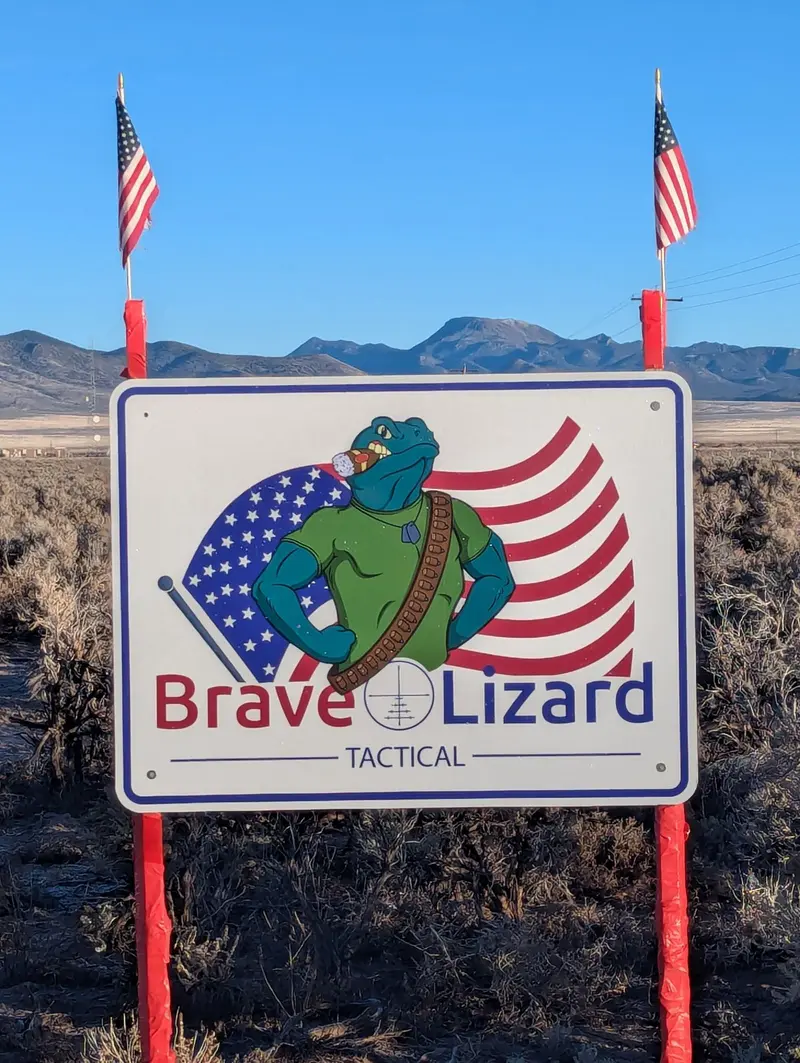 Brave Lizard Tactical entrance sign with American flags